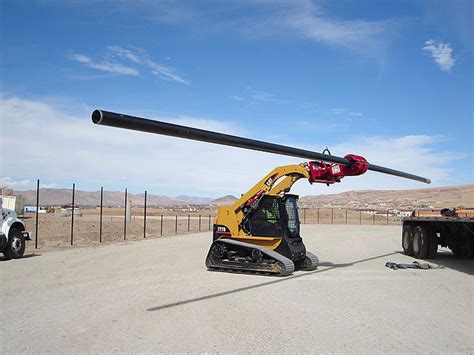 setting poles with skid steer|skid steer claw attachment.